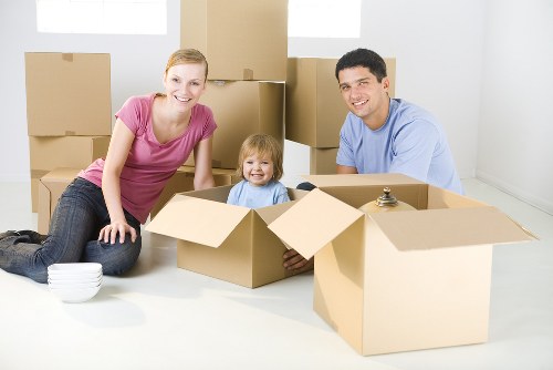 Removal van and moving boxes in Homerton