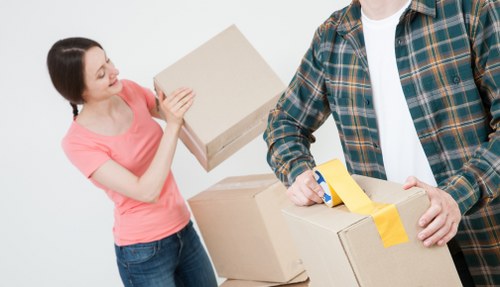 House removalists in Homerton loading furniture carefully into a moving van