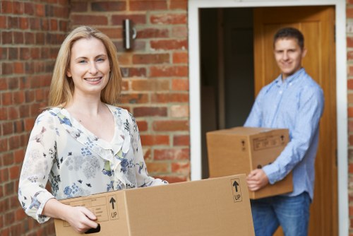 Business movers packing office equipment in Homerton