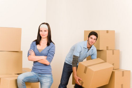 Local team carrying furniture from a property in Homerton
