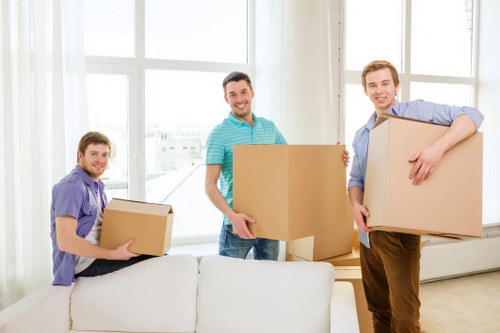 Professional furniture removal team loading items in Homerton