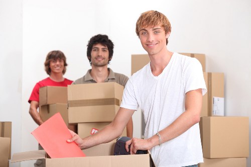Moving boxes and household items with a Homerton van service