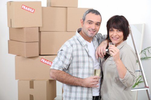 Professional movers handling furniture during removals in Homerton